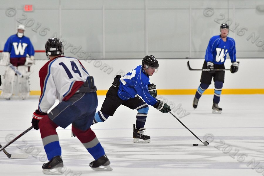 Wheaton College Men\'s Ice Hockey vs Middlesex Community College. - Photo By: KEITH NORDSTROM